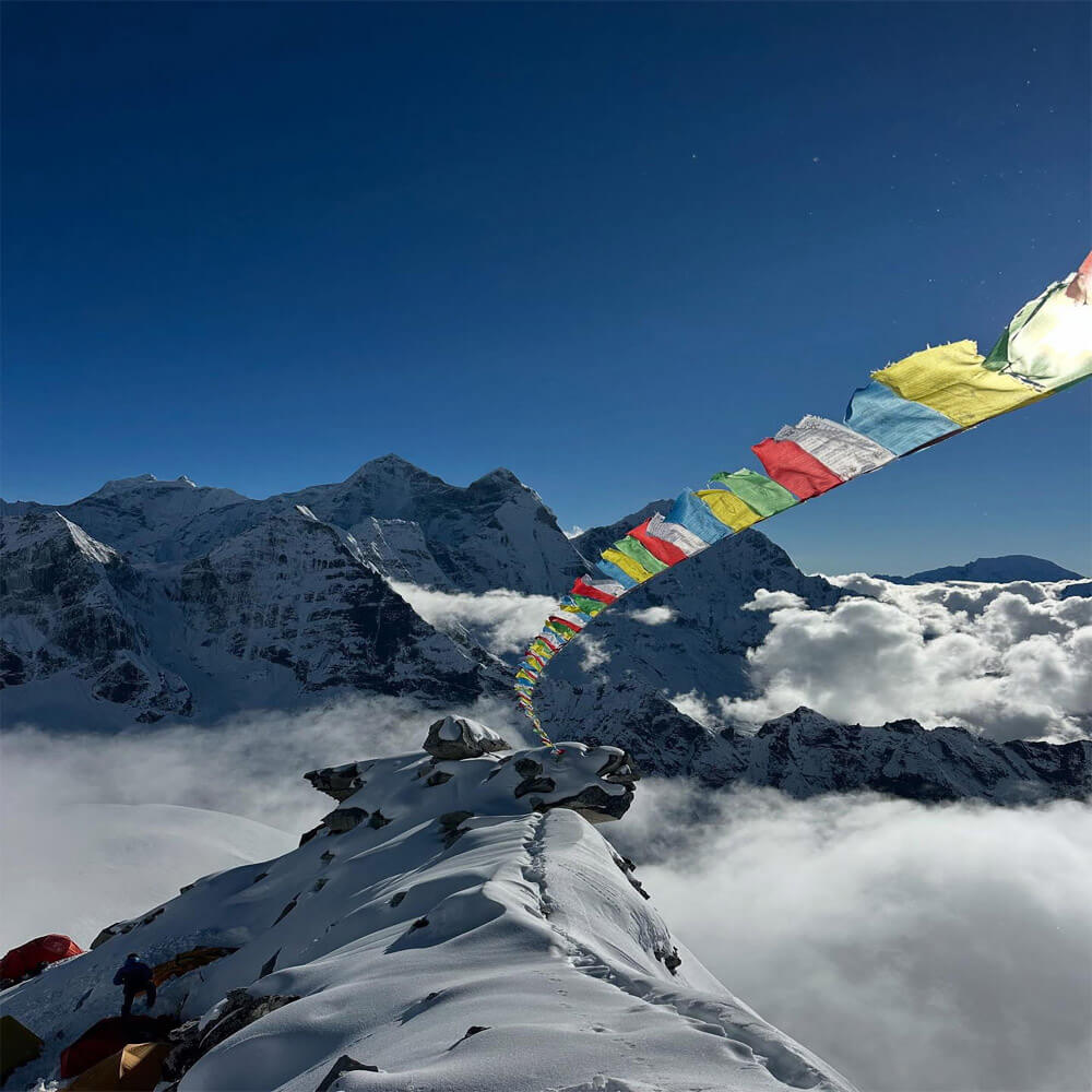 Sherpa in top of the Mountain